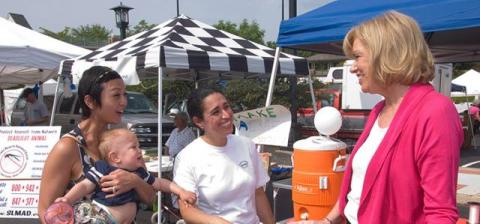 Julie speaking with mothers